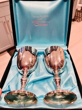 A pair of silver plated goblets